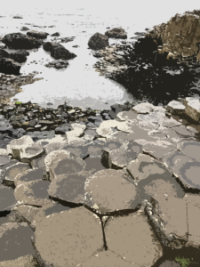 A photograph of the Giant's Causeway in Northern Ireland. Rocks along the shore of the ocean.